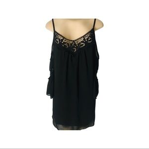black flowy open shoulder dress